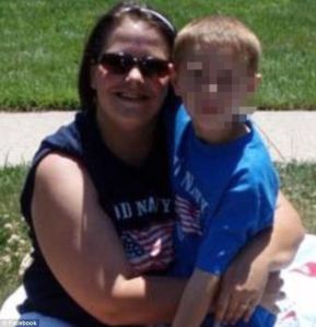 The horrible mother with her son, who does not have cancer. There does seem to be something amiss with his face, though...