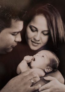 In happier times; Mr. and Mrs. Munoz with their first child. And she really wanted her second child to die with her?