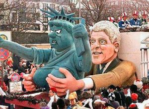 Racist float? Why not? Well, a) Bill Clinton's not black b) it's not a 4th of July parade, c) this is in Germany and d) it's not Obama.