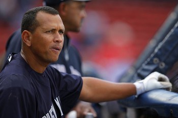 New York Yankees third baseman Alex Rodriguez warms up before the Yankees' American League baseball game against the Boston Red Sox at Fenway Park in Boston, Massachusetts August 16, 2013.  REUTERS/Brian Snyder  (UNITED STATES - Tags: SPORT BASEBALL)
