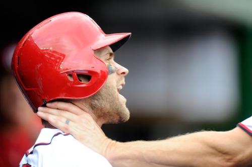 WASHINGTON, DC - SEPTEMBER 27: Bryce Harper #34 of the Washington Nationals is grabbed by Jonathan Papelbon #58 in the eighth inning against the Philadelphia Phillies at Nationals Park on September 27, 2015 in Washington, DC. (Photo by Greg Fiume/Getty Images) ORG XMIT: 538595765 ORIG FILE ID: 490330798