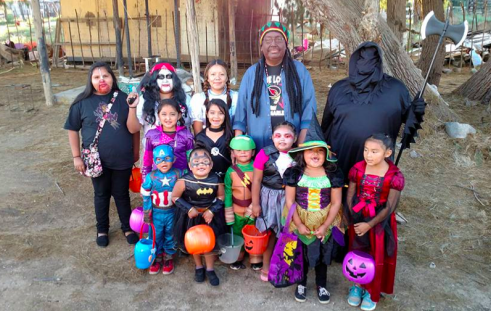 The Native American in the middle is dressed as a famous Jamaican. Would it have been offensive if he dressed as Sitting Bull?