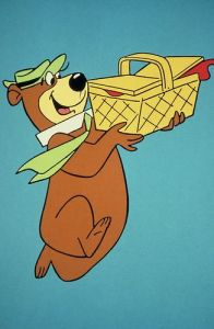 There are no good pictures of Jean stealing a loaf of bread, but here's Yogi Bear stealing a picnic basket...