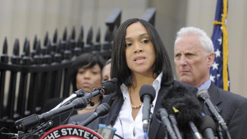 Mosby in 2015, ruining lives, pandering to the mob, and undermining justice...