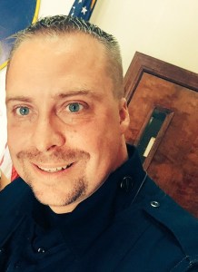 This nice officer appears to be lobotomized, which at least gives him an excuse for his conduct...