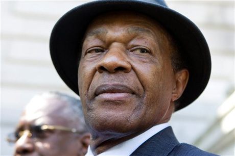 Former District of Columbia Mayor Marion Barry attends a news conference on the steps of Washington's city hall Monday, July 6, 2009. At the news conference Barry's attorney Frederick Cooke said Barry vehemently denies the allegation by Donna Watts-Brighthaupt, and that he's confident the stalking charge will be dropped. Barry, 73, stood behind Cooke but said nothing. (AP Photo/Manuel Balce Ceneta)