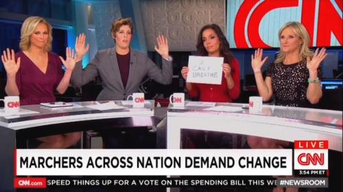 cnn-newsroom-hands-up