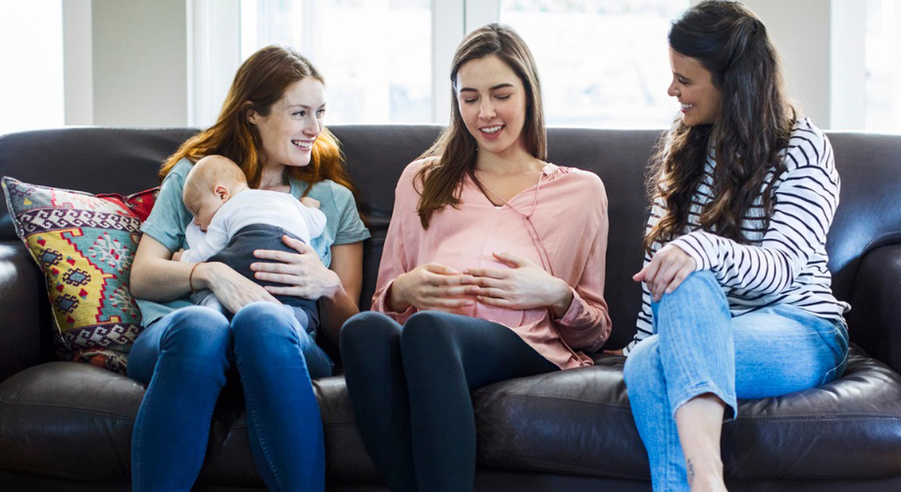 pregnant-woman-with-friends